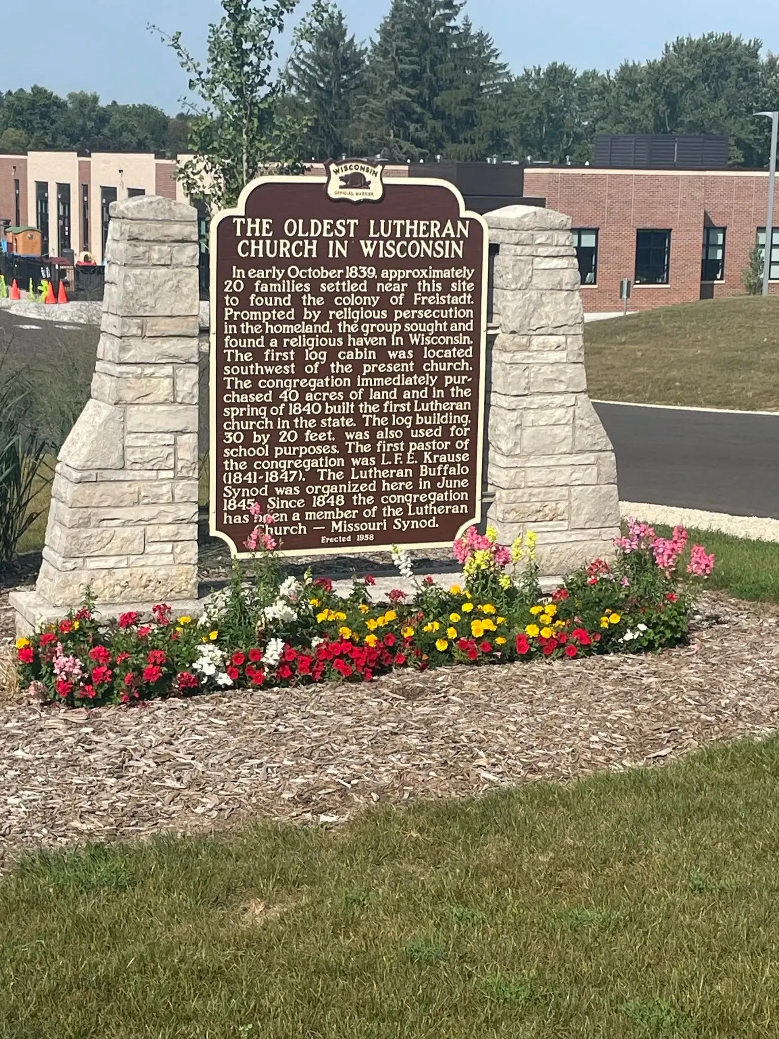Wisconsin state historical marker for the Oldest Lutheran Church in Wisconsin, which names Rev. Krause